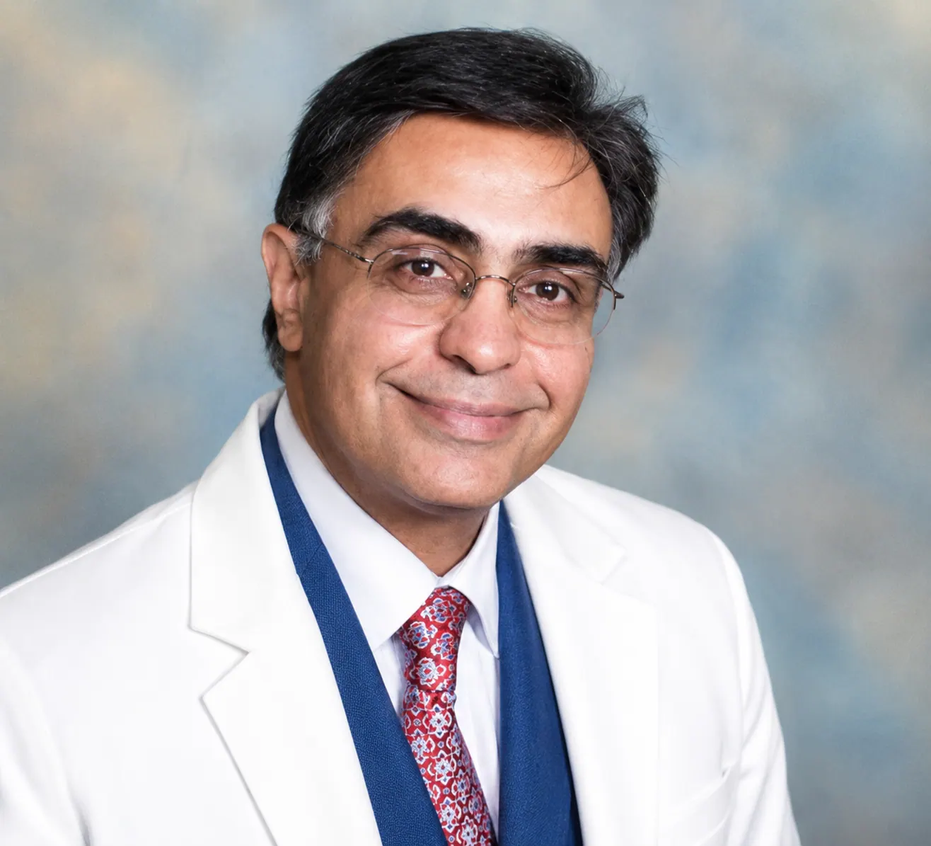Portrait of Dr. Ali Sherzoy, Medical Director