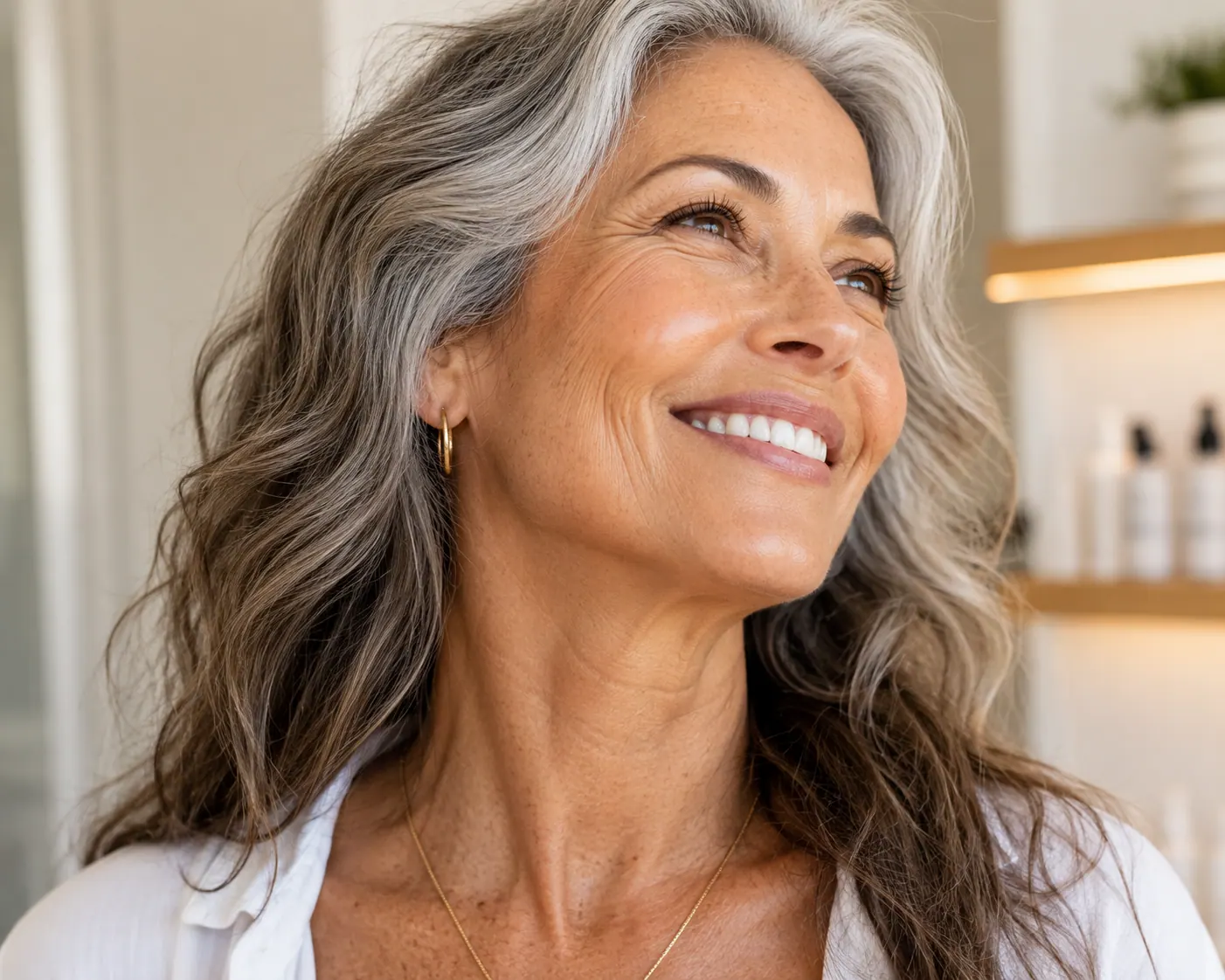 Non-Surgical Loose Skin Tightening Patient | Englewood Med Spa Woman with grey hair smiling after non-surgical loose skin tightening at Englewood Med Spa in Bergen County, NJ